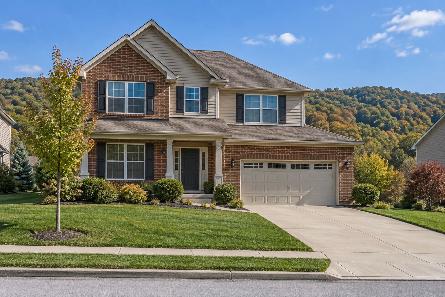 Two story suburban home with a front lawn, illustrative