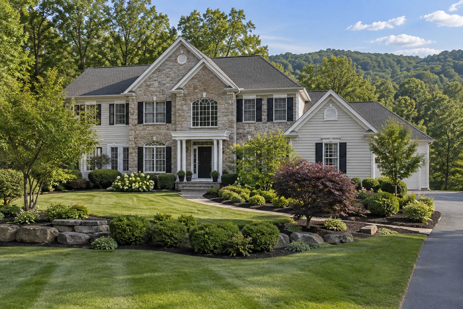 Stone front family home with landscaped lawn, illustrative
